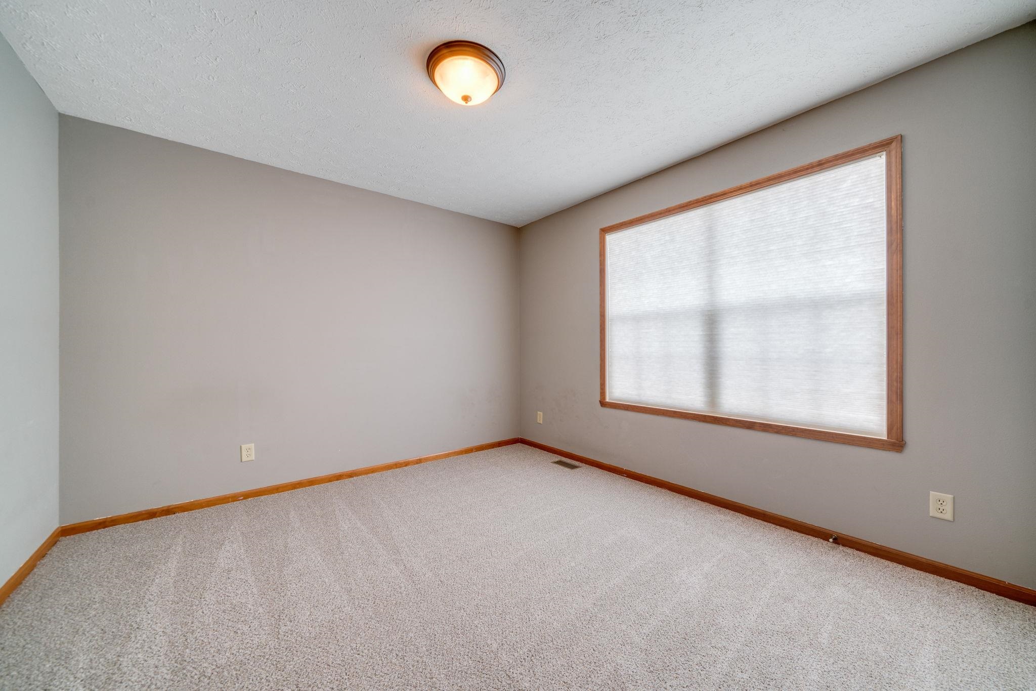 11062 Chicory Ridge Way Roscoe, IL 61073 - Photo 20 of 43 an empty room with a window