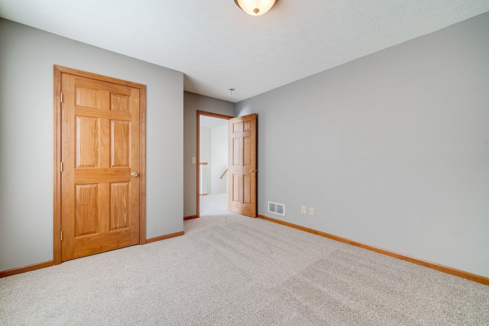 11062 Chicory Ridge Way Roscoe, IL 61073 - Photo 21 of 43 an empty room with windows