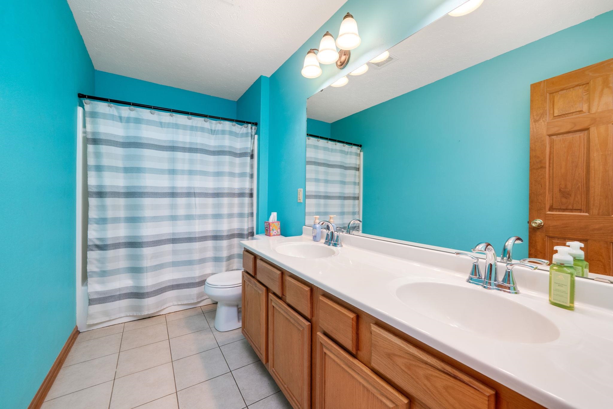 11062 Chicory Ridge Way Roscoe, IL 61073 - Photo 24 of 43 a bathroom with a sink a toilet and shower