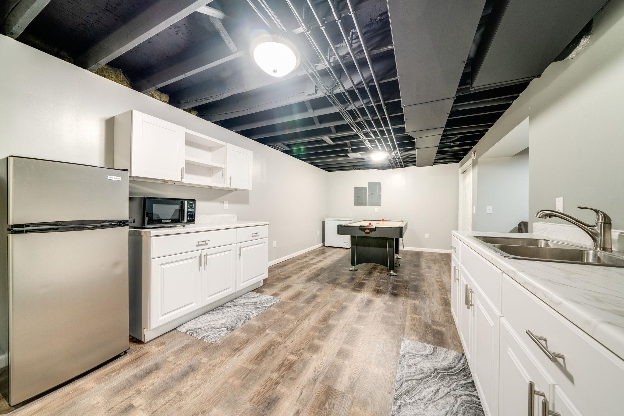 11062 Chicory Ridge Way Roscoe, IL 61073 - Photo 36 of 43 a kitchen with a sink appliances and cabinets