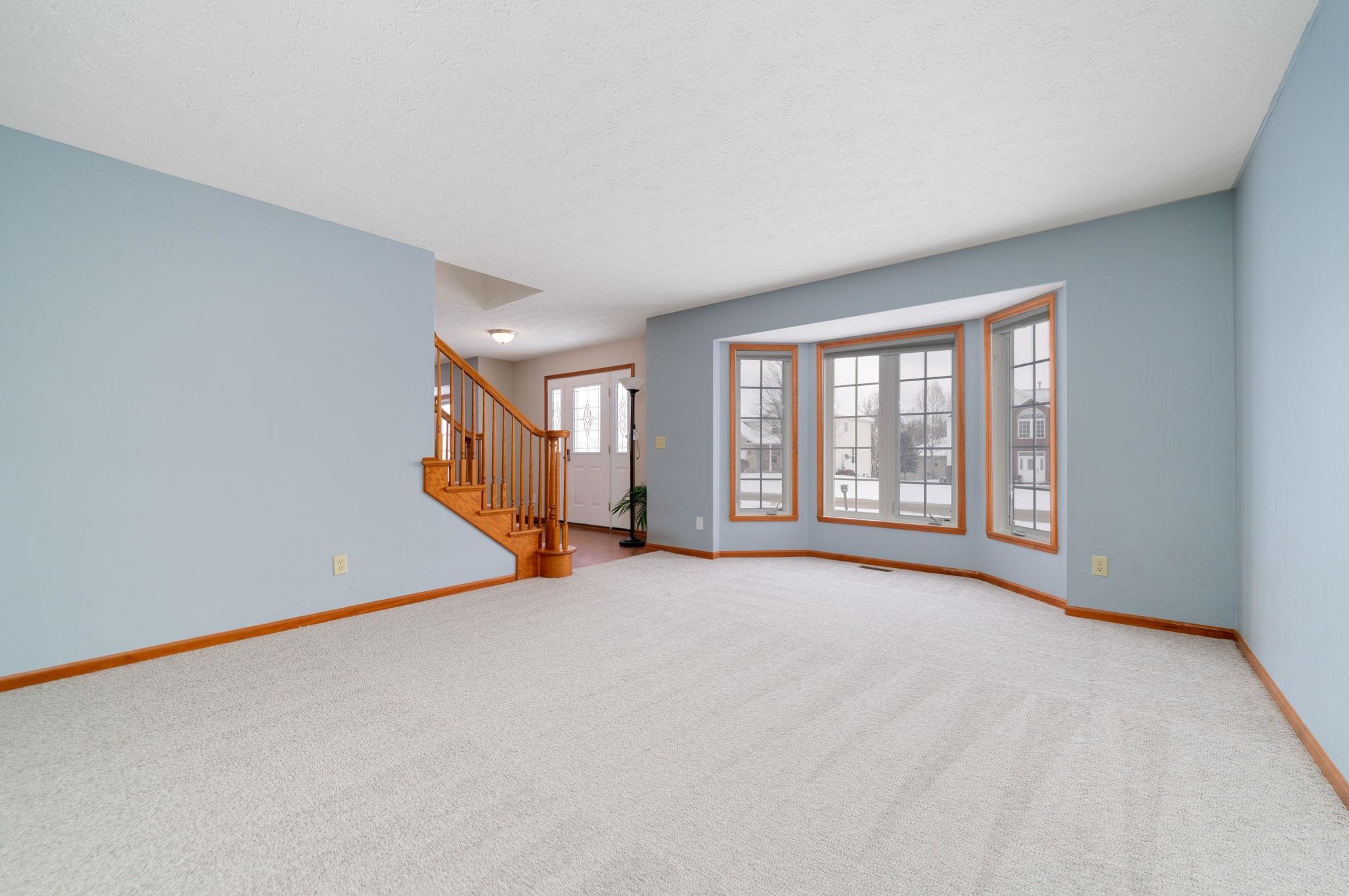 11062 Chicory Ridge Way Roscoe, IL 61073 - Photo 6 of 43 a view of an empty room with a window