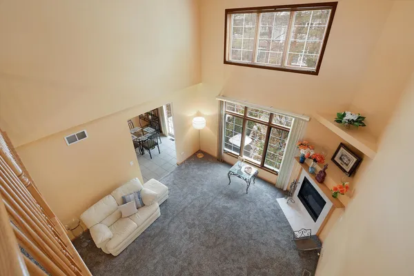with living room with furniture and a fireplace
