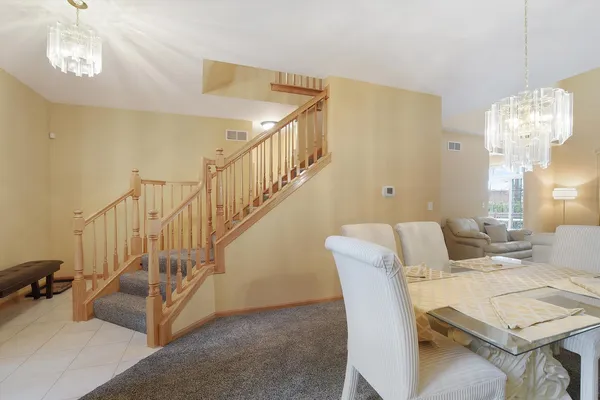 a view of livingroom with furniture and stairs