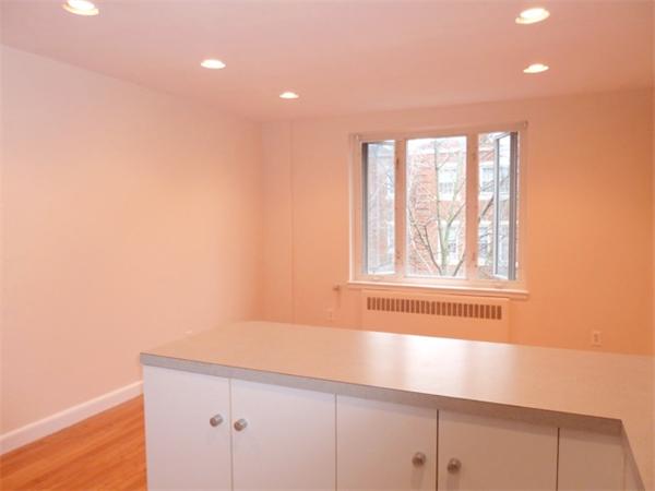 150 Beaconsfield Road, Unit 5 Brookline, MA 02445 - Photo 3 of 7 a view of empty room with window