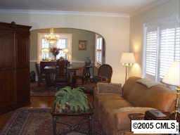 2443 Providence Road Charlotte, NC 28211 - Photo 8 of 8 a living room with furniture and wooden floor