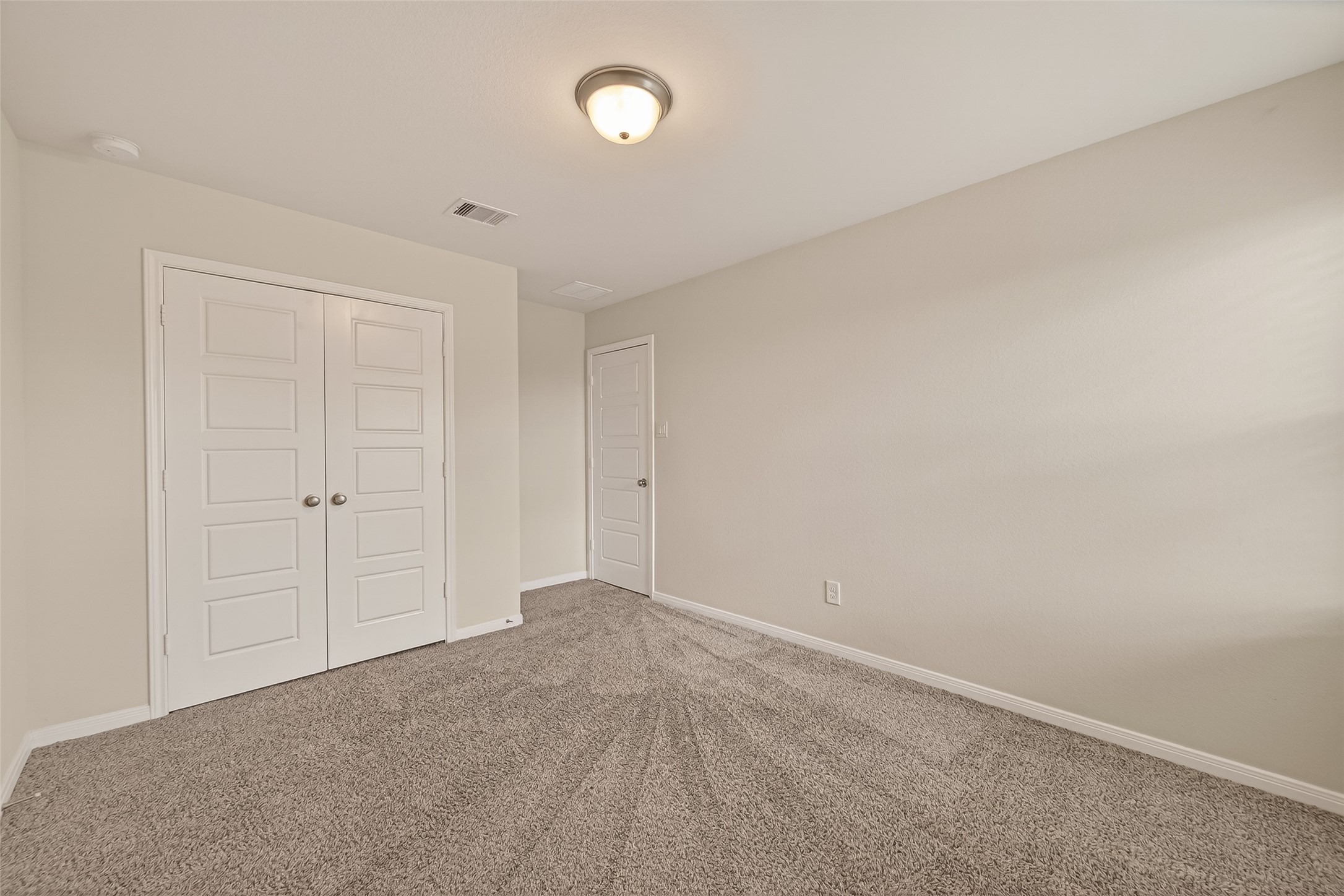 4231 Reese Ravine Lane Katy, TX 77493 - Photo 24 of 32 Another look at one of the bedrooms and double door closet