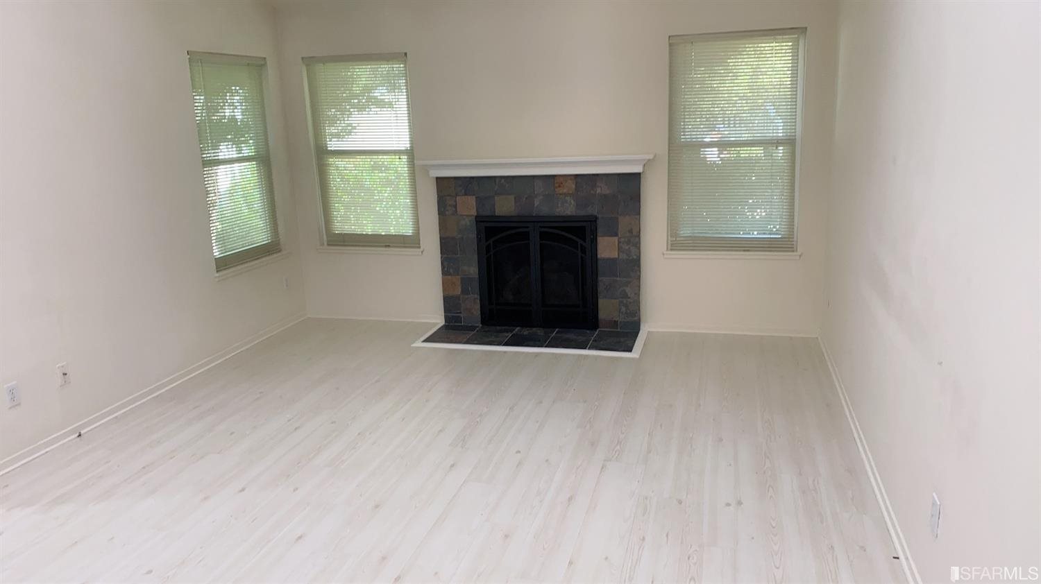 420 Camelback Road Pleasant Hill, CA 94523 - Photo 2 of 32 an empty room with windows and fireplace