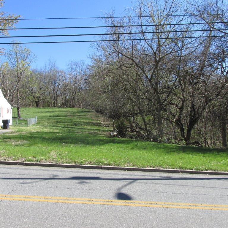 2048 Riverdale Road Southeast Roanoke, VA 24014 - Photo 3 of 5 a view of a yard with a wooden fence