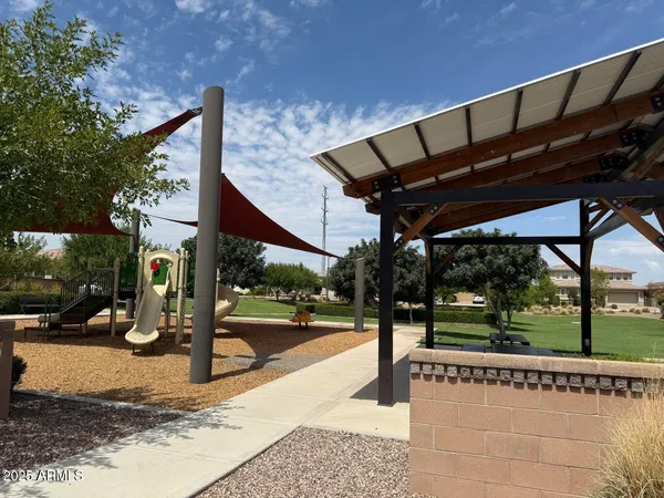 a view of a street with a building in the background