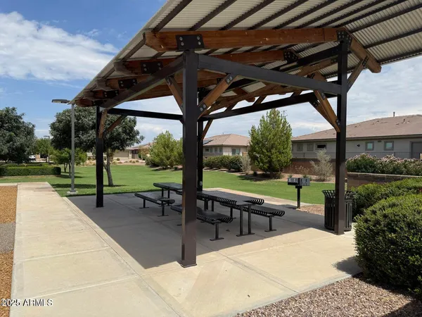 a view of a swimming pool with a porch