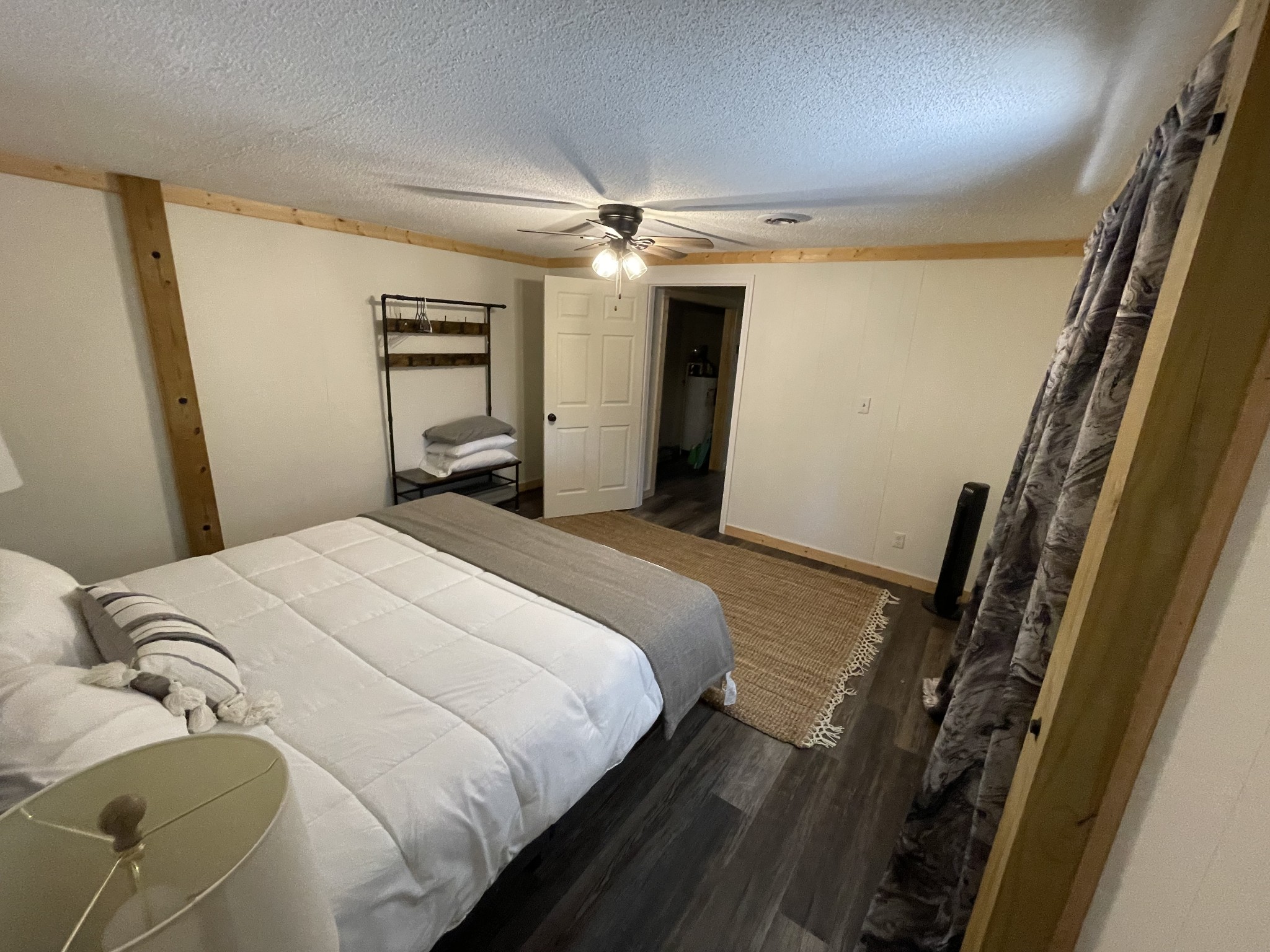 4875 Dollar Road Buena Vista, TN 38318 - Photo 13 of 29 a bedroom with a bed and a mirror