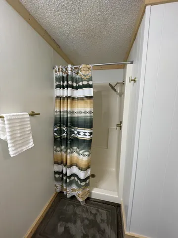 a room with water heater and a window