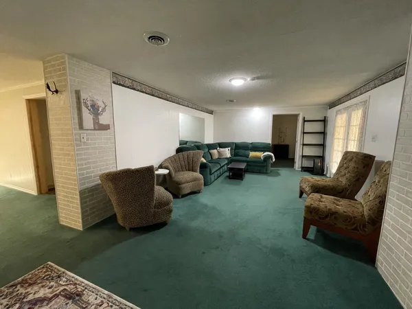 a living room with furniture and a couch