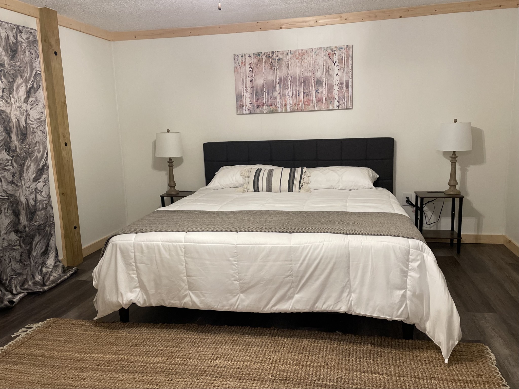 4875 Dollar Road Buena Vista, TN 38318 - Photo 10 of 29 a bedroom with a bed and wooden floor
