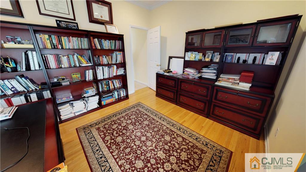 39 Zaitz Farm Road West Windsor, NJ 08550 - Photo 11 of 24 a book shelf with a book shelf