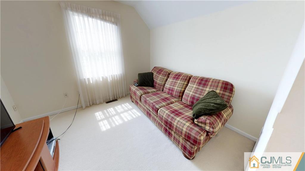 39 Zaitz Farm Road West Windsor, NJ 08550 - Photo 17 of 24 a living room with furniture and a window