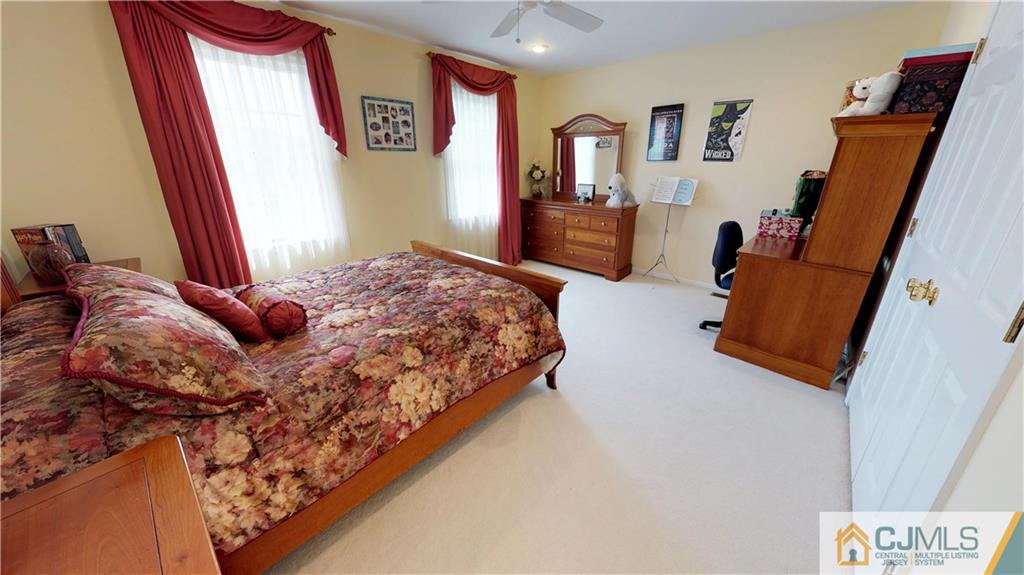 39 Zaitz Farm Road West Windsor, NJ 08550 - Photo 18 of 24 a bedroom with a bed and wooden floor
