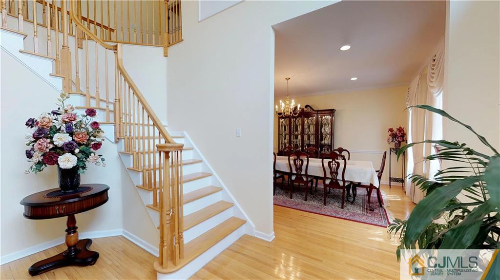 39 Zaitz Farm Road West Windsor, NJ 08550 - Photo 3 of 24 a view of entryway and hall with wooden floor