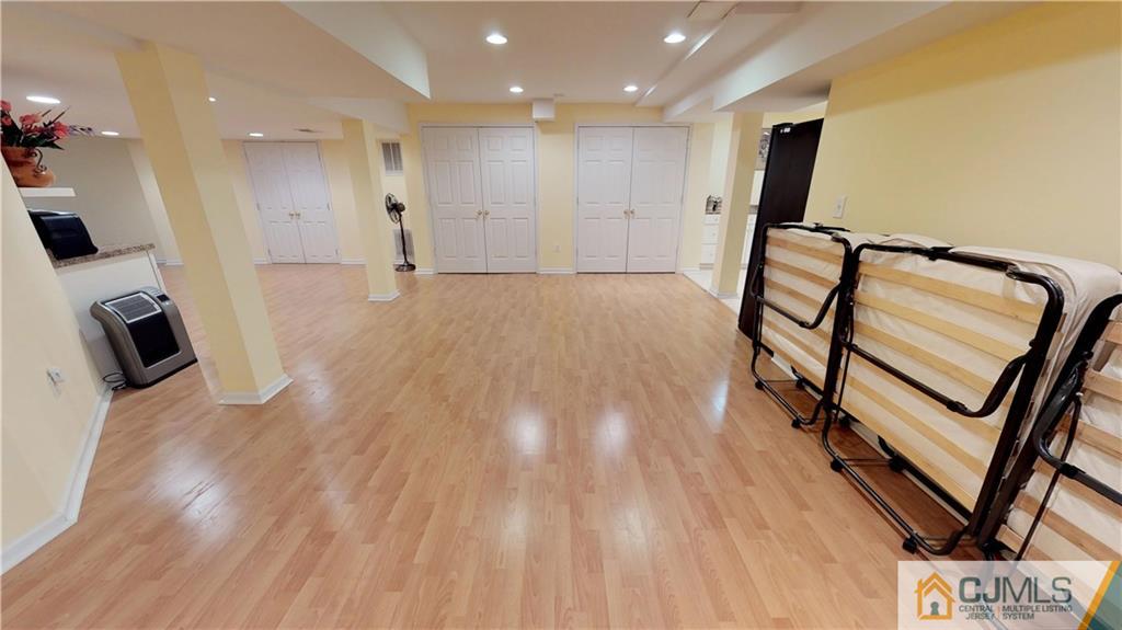 39 Zaitz Farm Road West Windsor, NJ 08550 - Photo 23 of 24 a view of a hallway with wooden floor and staircase