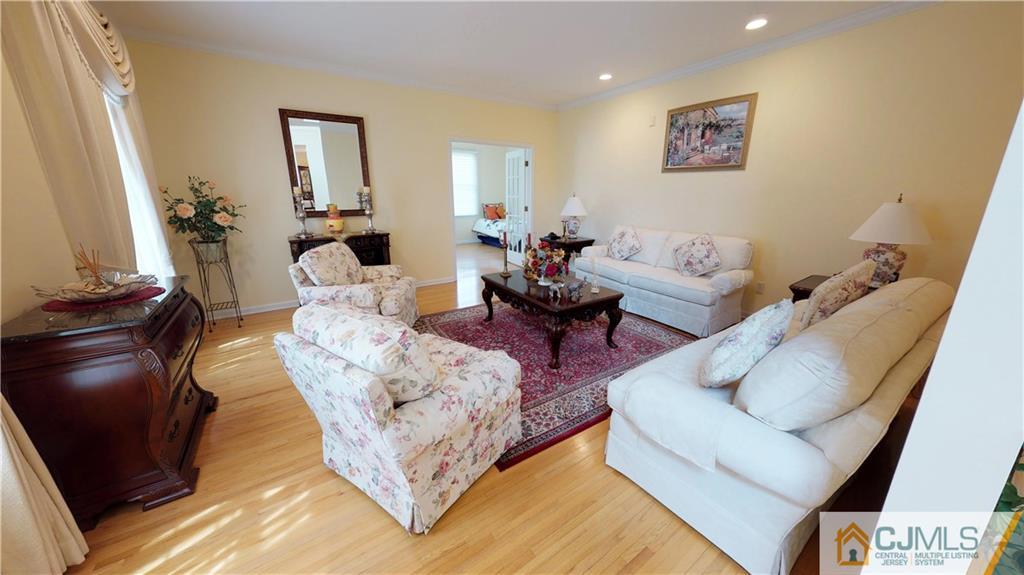 39 Zaitz Farm Road West Windsor, NJ 08550 - Photo 4 of 24 a living room with furniture and wooden floor