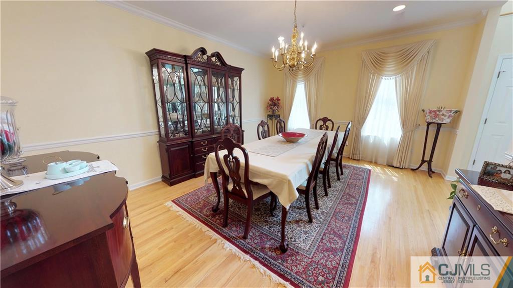 39 Zaitz Farm Road West Windsor, NJ 08550 - Photo 6 of 24 a view of a dining room with furniture and wooden floor