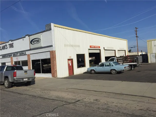 a view of a cars parked in front of a building