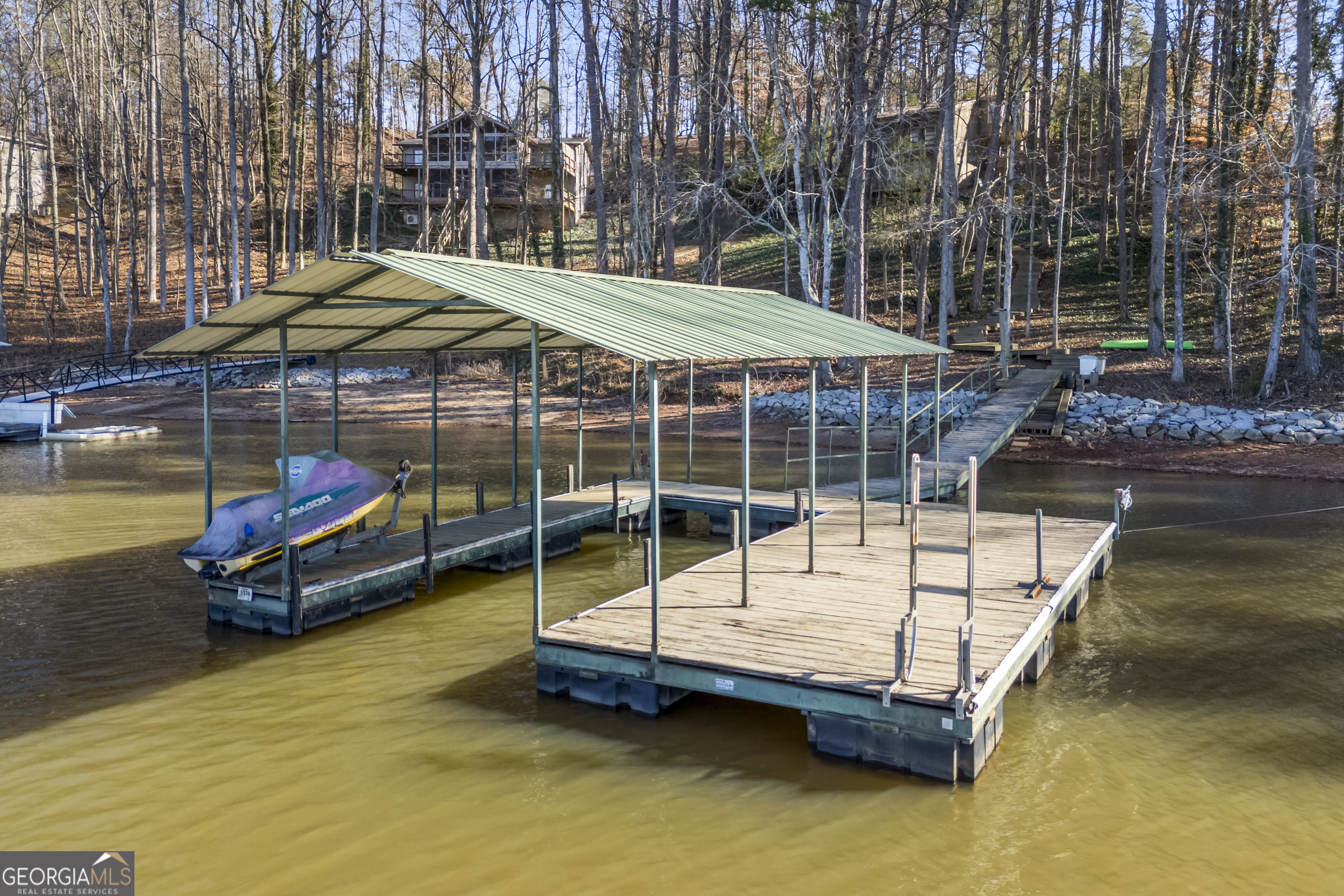 59 Waters Edge Extension Martin, GA 30557 - Photo 11 of 48 a small pool is sitting in the middle of a swimming pool