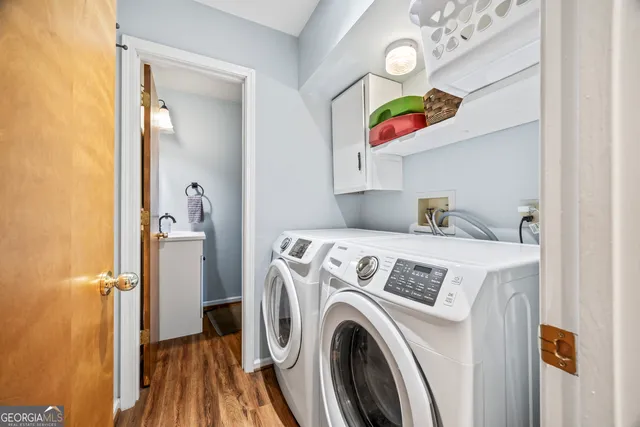a view of washer and dryer in a utility room