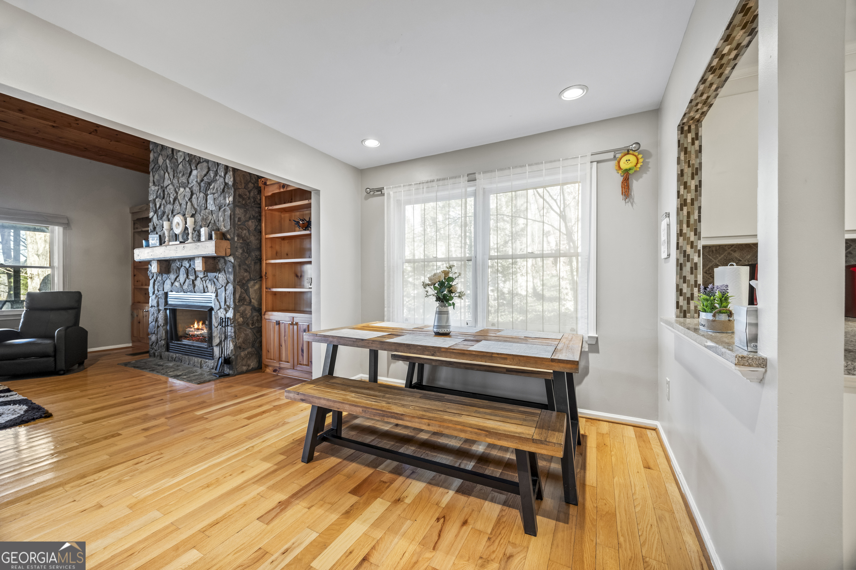59 Waters Edge Extension Martin, GA 30557 - Photo 19 of 48 a living room with furniture and a fireplace
