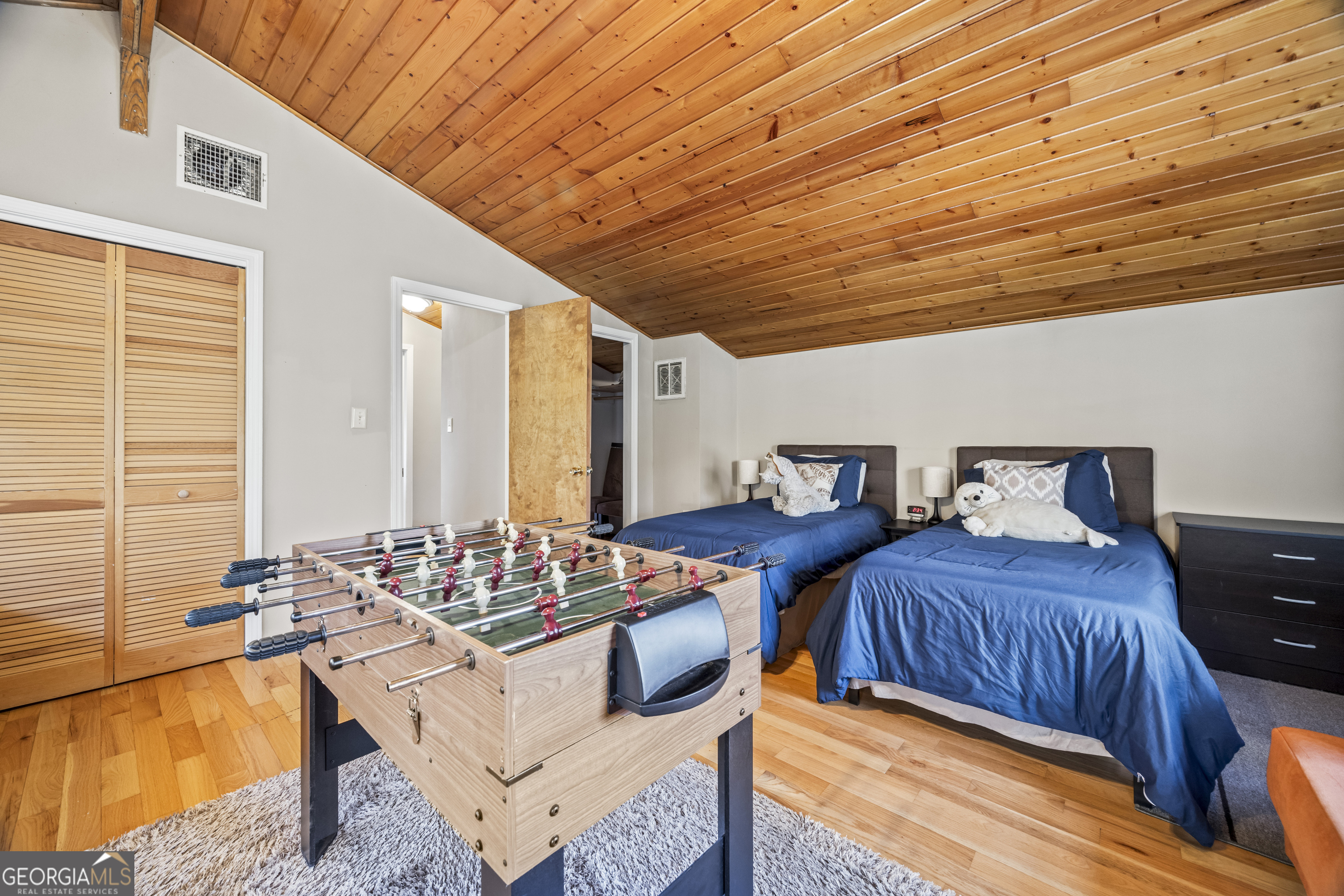 59 Waters Edge Extension Martin, GA 30557 - Photo 39 of 48 a bedroom with furniture and a large window