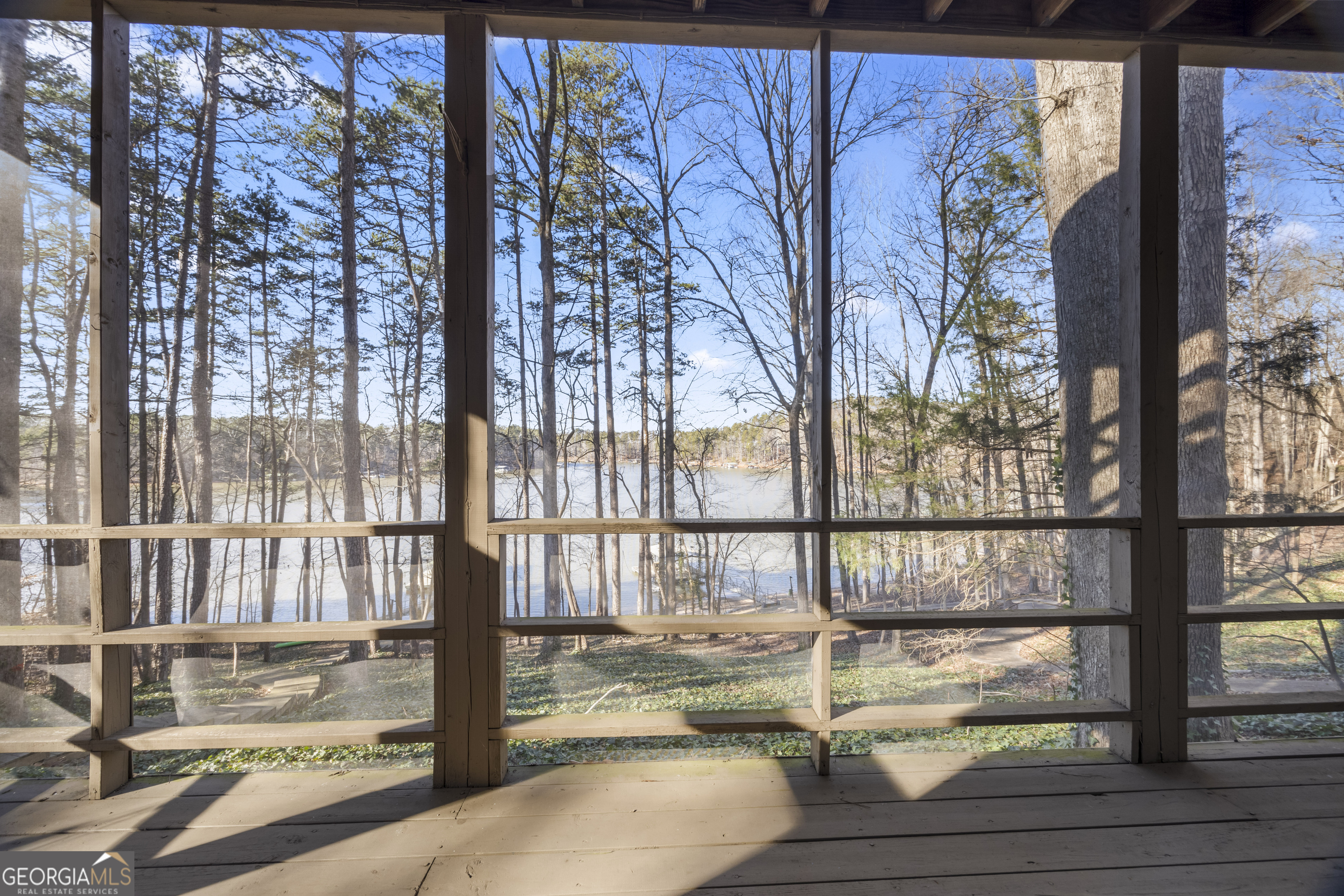 59 Waters Edge Extension Martin, GA 30557 - Photo 44 of 48 a view of a porch with a floor to ceiling window