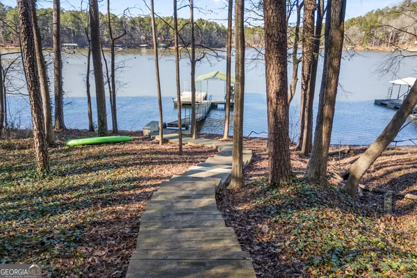 a view of a backyard with potted plants