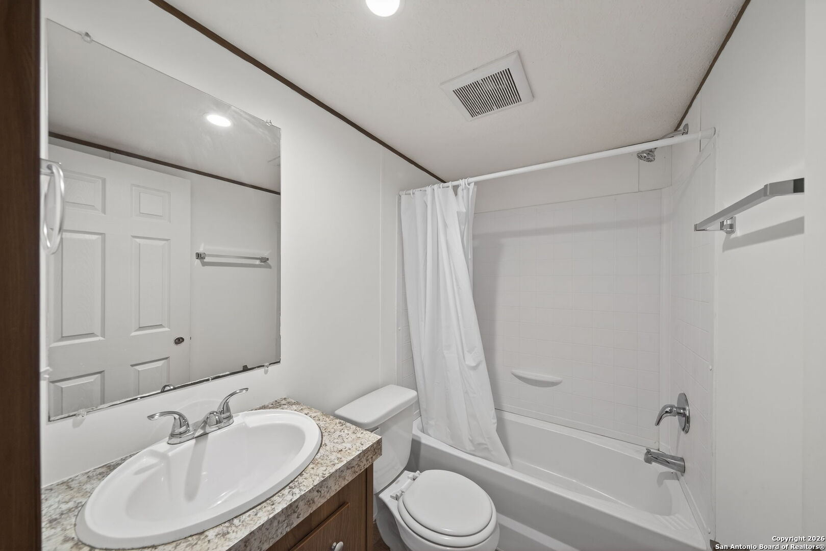 Lot 38 Pr 1510 Bandera, TX 78003 - Photo 20 of 30 a bathroom with a granite countertop sink toilet and shower