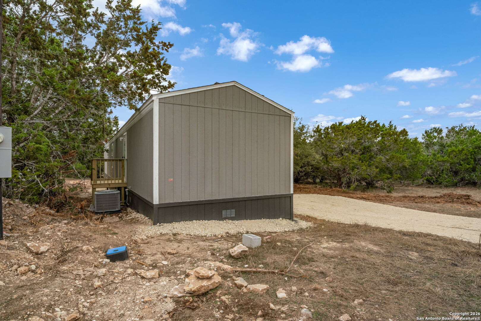Lot 38 Pr 1510 Bandera, TX 78003 - Photo 23 of 30 a backyard of a house with lots of green space
