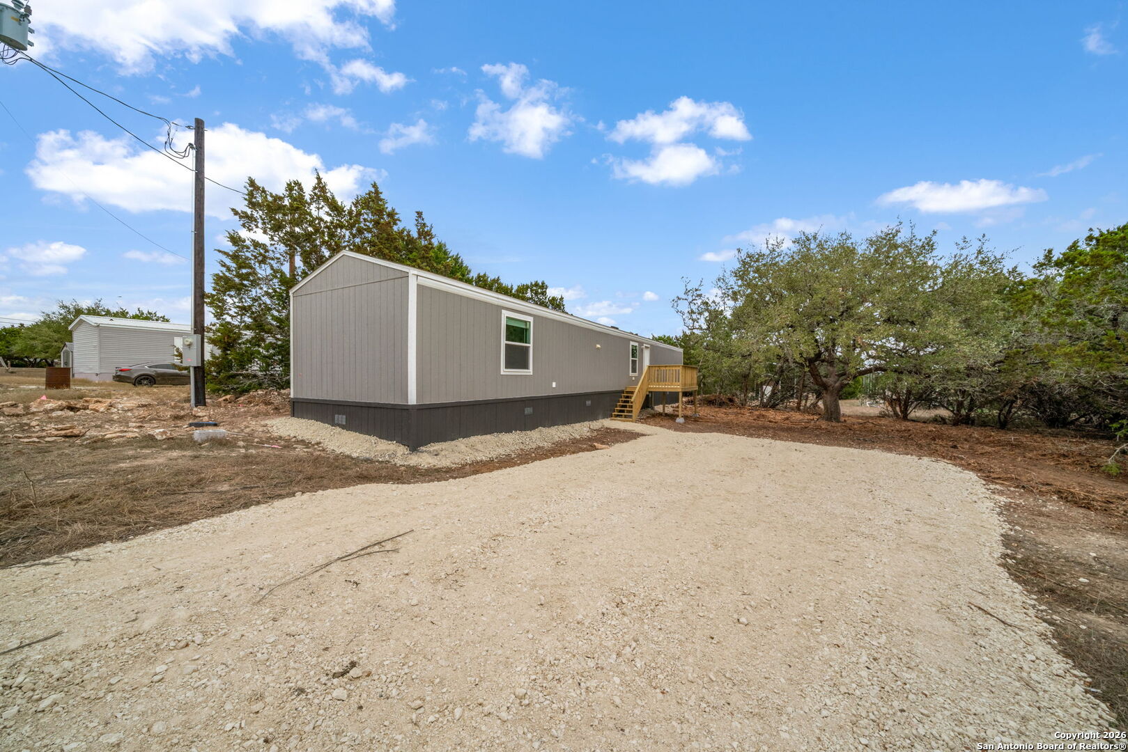 Lot 38 Pr 1510 Bandera, TX 78003 - Photo 3 of 30 a view of a house with a yard
