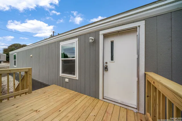 a front view of a house with a terrace