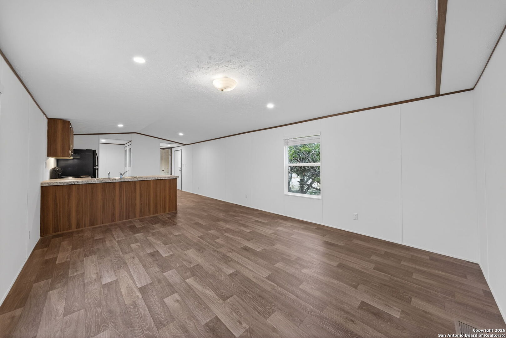 Lot 38 Pr 1510 Bandera, TX 78003 - Photo 7 of 30 a view of a livingroom with wooden floor