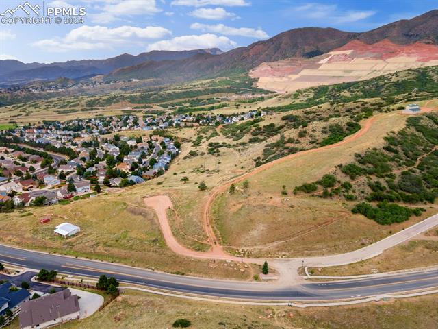 7730 Julynn Road Colorado Springs, CO 80919 - Photo 45 of 48 Bird's eye view with a mountain view