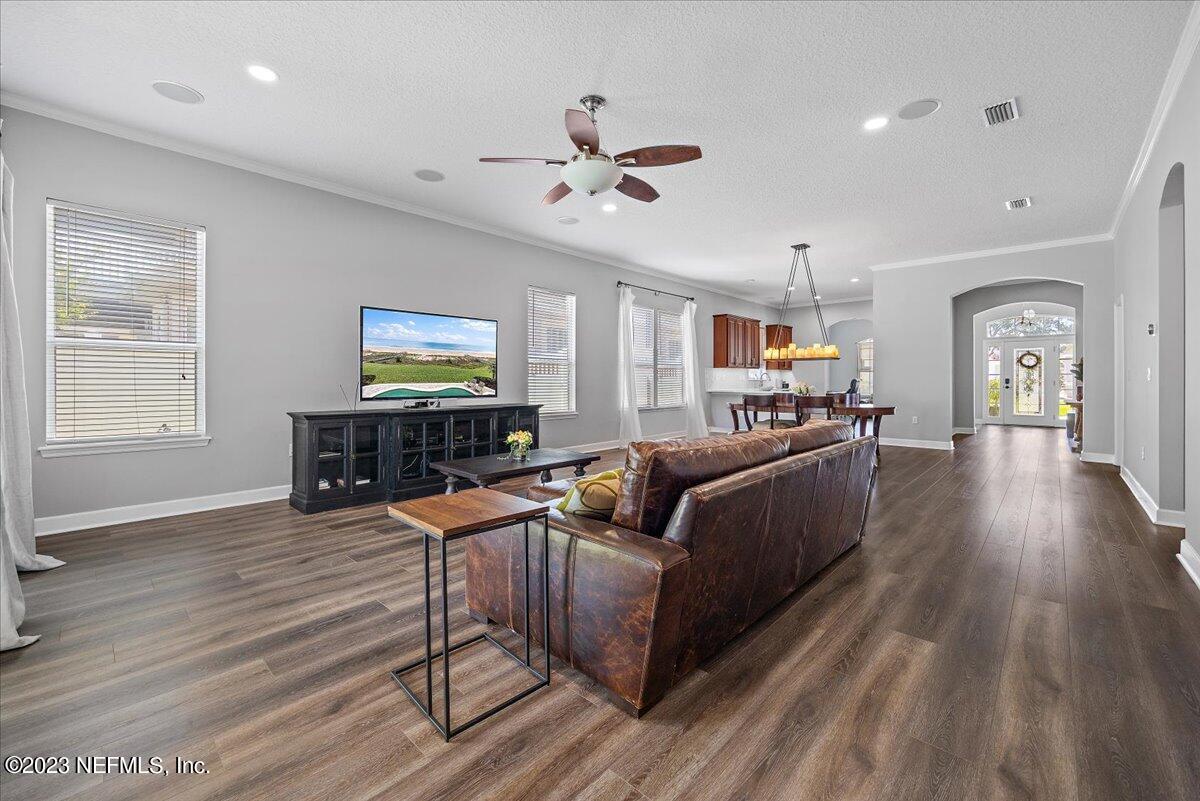 4591 Reed Bark Lane Jacksonville, FL 32246 - Photo 5 of 27 08-Family Room to Kitchen