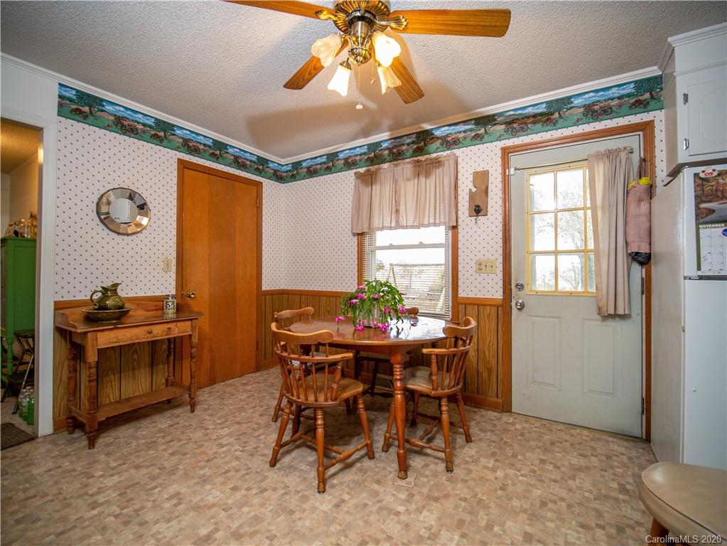 1956 Tradesville Road Lancaster, SC 29720 - Photo 11 of 18 a view of a dining room with furniture window and outside view
