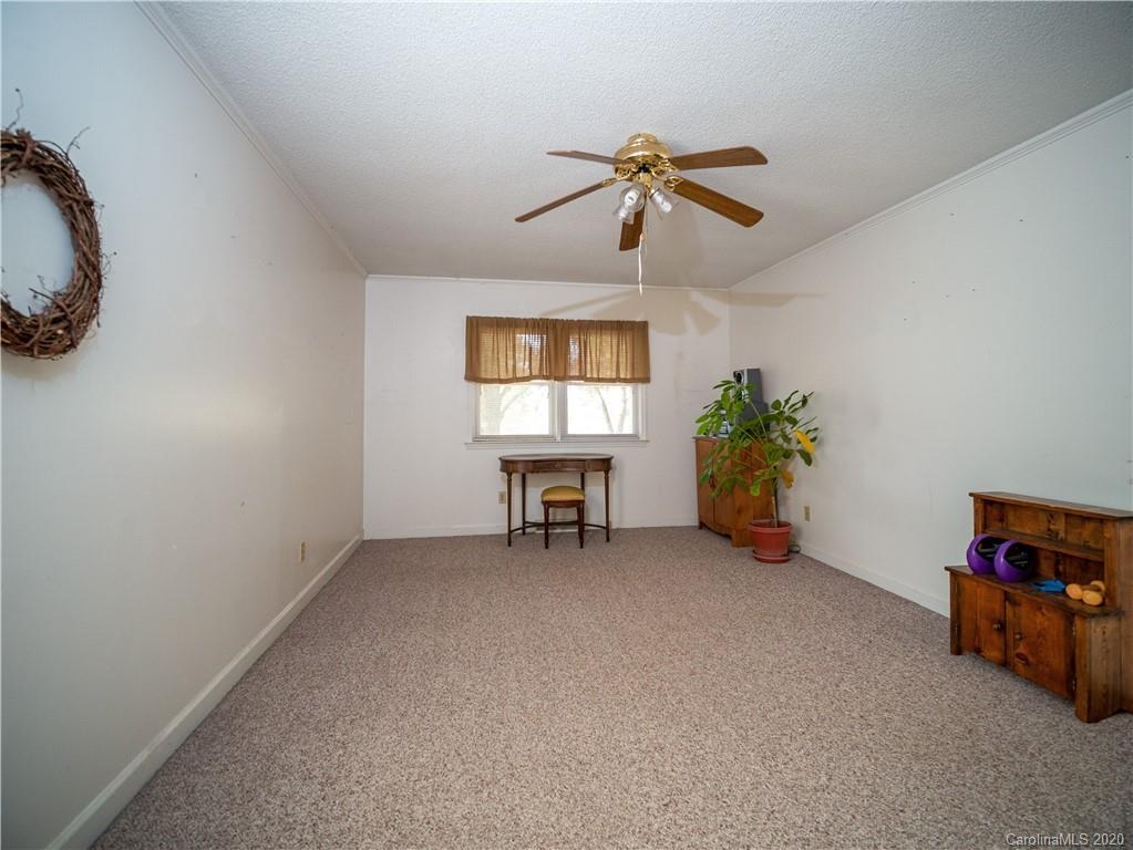1956 Tradesville Road Lancaster, SC 29720 - Photo 5 of 18 a view of a room with furniture and a window