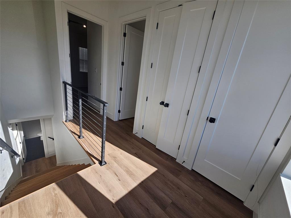 2139 Mail Avenue, Unit 101 Dallas, TX 75235 - Photo 13 of 21 a view of entryway with stairs and wooden floor