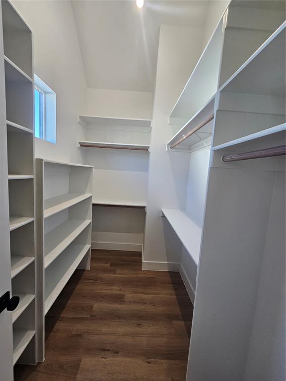 2139 Mail Avenue, Unit 101 Dallas, TX 75235 - Photo 20 of 21 a view of walk in closet with empty racks