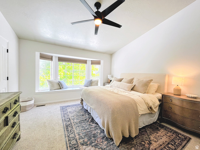 12169 Hidden Valley Road, Unit 44 Sandy, UT 84092 - Photo 18 of 49 Carpet flooring, bay window with window seat, ceiling fan, and white walls