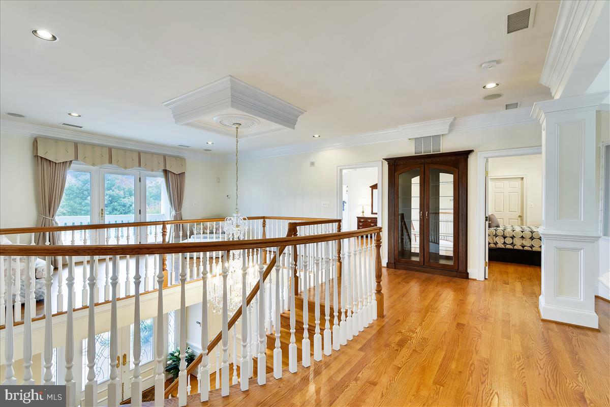 40887 Robin Circle Leesburg, VA 20175 - Photo 39 of 100 Second floor landing; chandelier lift