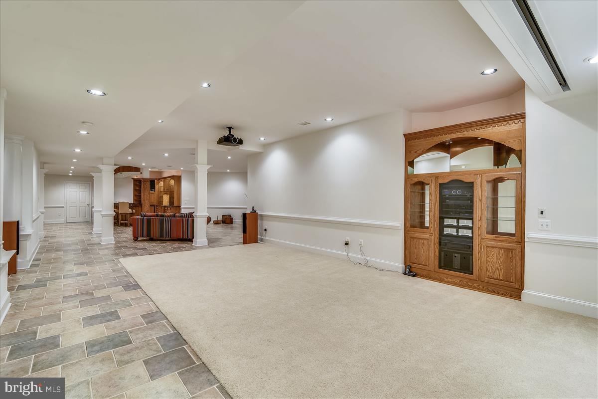 40887 Robin Circle Leesburg, VA 20175 - Photo 66 of 100 Drop down projector screen; surround sound system