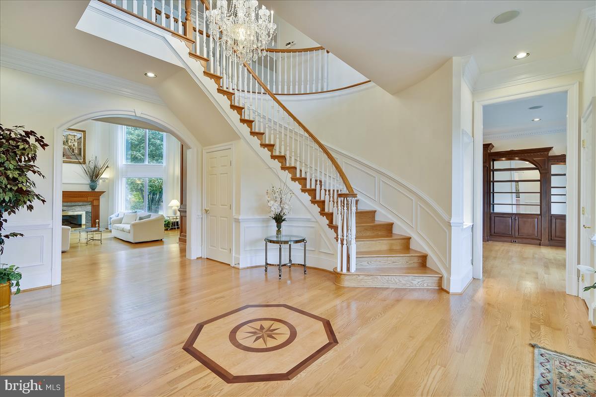 40887 Robin Circle Leesburg, VA 20175 - Photo 8 of 100 Gorgeous curved hardwood staircase