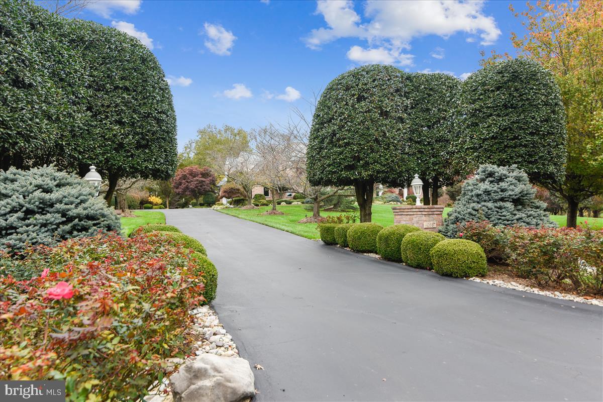 40887 Robin Circle Leesburg, VA 20175 - Photo 84 of 100 Beautiful landscaping lines the driveway entrance
