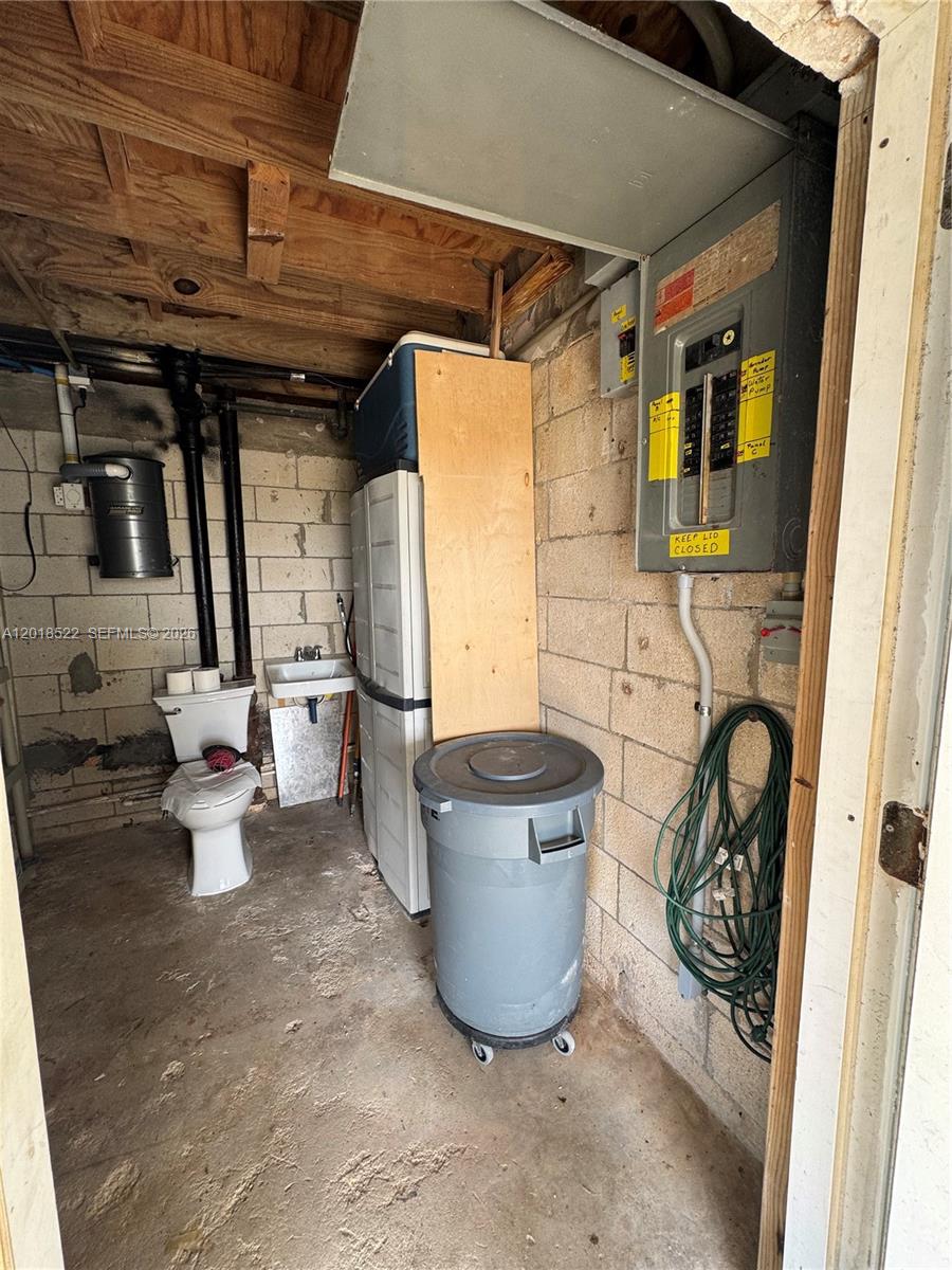 4276 Dorn Road Summerland Key, FL 33042 - Photo 18 of 23 a bathroom with a granite countertop toilet and a shower