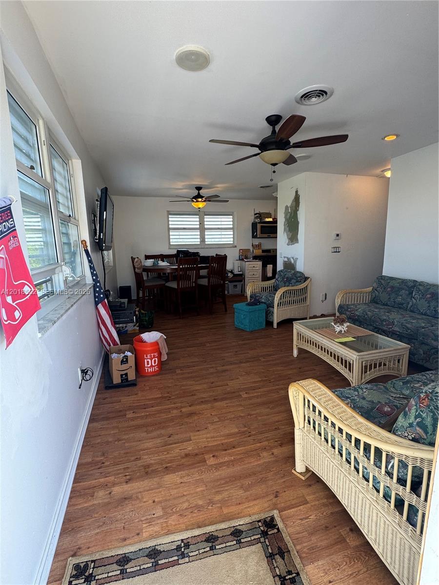 4276 Dorn Road Summerland Key, FL 33042 - Photo 6 of 23 a bedroom with furniture and a wooden floor